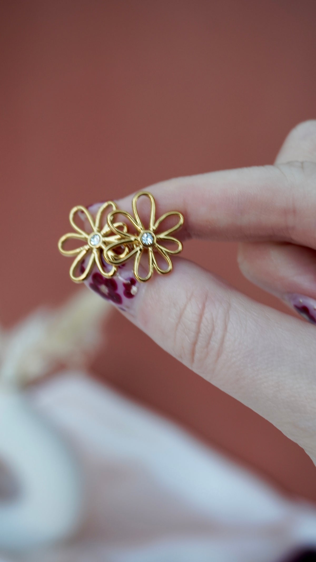 Boucles fleurs acier inoxydable